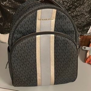 Michael Kors Large Backpack no tears or tears or breaks .